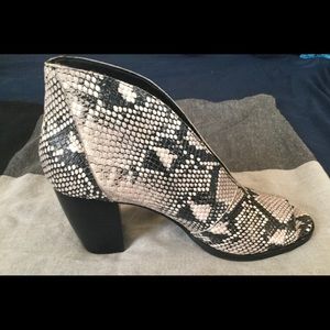 Trendy Style Bootie with open-toe silhouette. New!